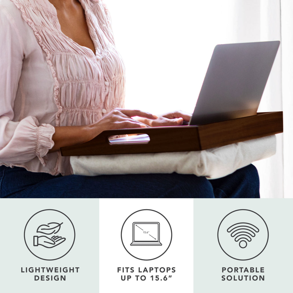 Person using a laptop on a portable wooden desk with product features displayed below.