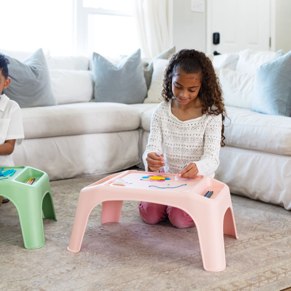 Rose Quartz Turtle Table Activity Desk with kids doing arts and crafts on it.