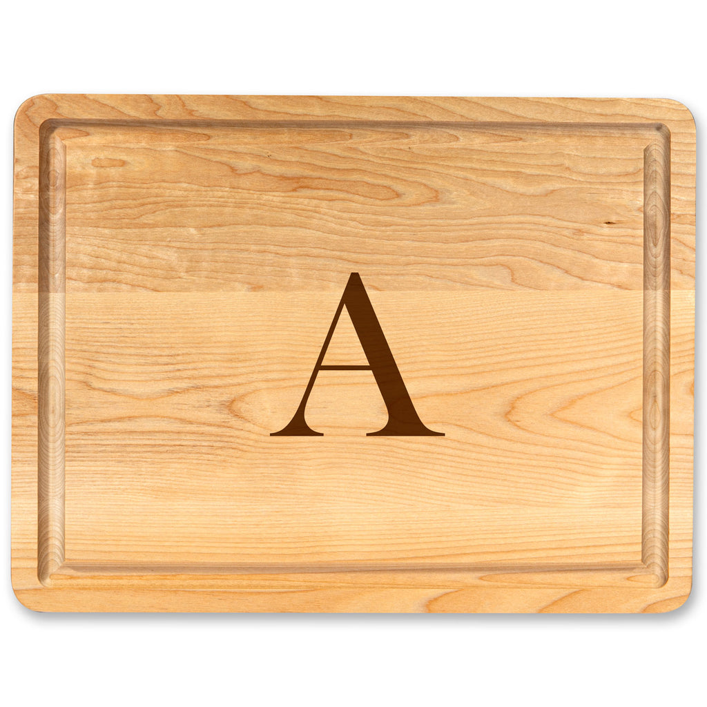 Wooden cutting board with a engraved letter 'A' in the center on a white background
